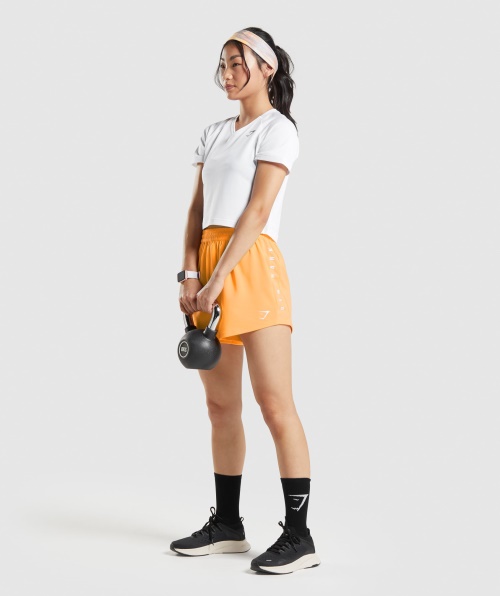 Calção Solto Gymshark Esportivo Laranja Damasco