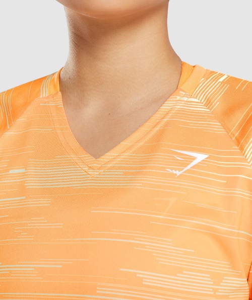 Camiseta Midi Esporte Gymshark Estampa Laranja