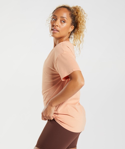 Camiseta Gymshark Whitney Oversized Sunset Bege