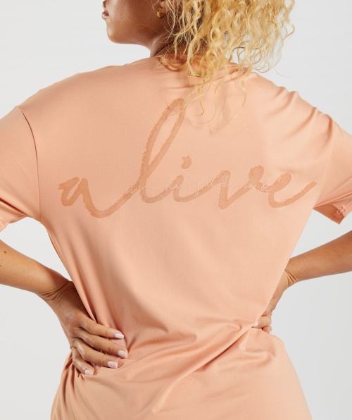 Camiseta Gymshark Whitney Oversized Sunset Bege